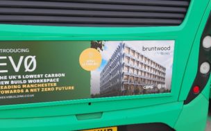 a zoomed in shot of the campaign creative on the back of an electric bus